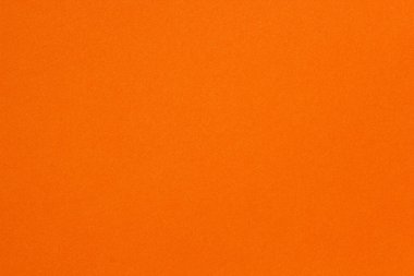 İnce tahıllı parlak turuncu kağıt dokusu, yaratıcı tasarımlar, el sanatları ve modern görsel projeler için mükemmel..