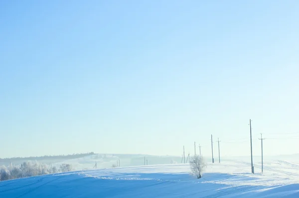 Snow-covered meadows. — Stock Photo, Image