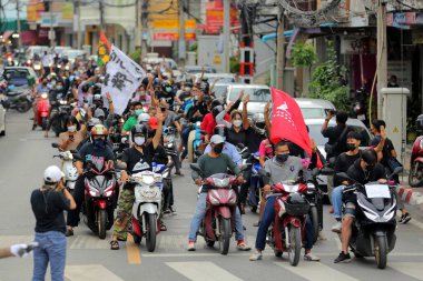 Nakhonratchasima, Thailand - July 23, 2021 : Car mob street of Thailand people took to the streets to protest against the military coup Protesters to show symbolic gestures at democracy.