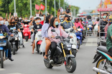 Nakhonratchasima, Thailand - July 23, 2021 : Car mob street of Thailand people took to the streets to protest against the military coup Protesters to show symbolic gestures at democracy.