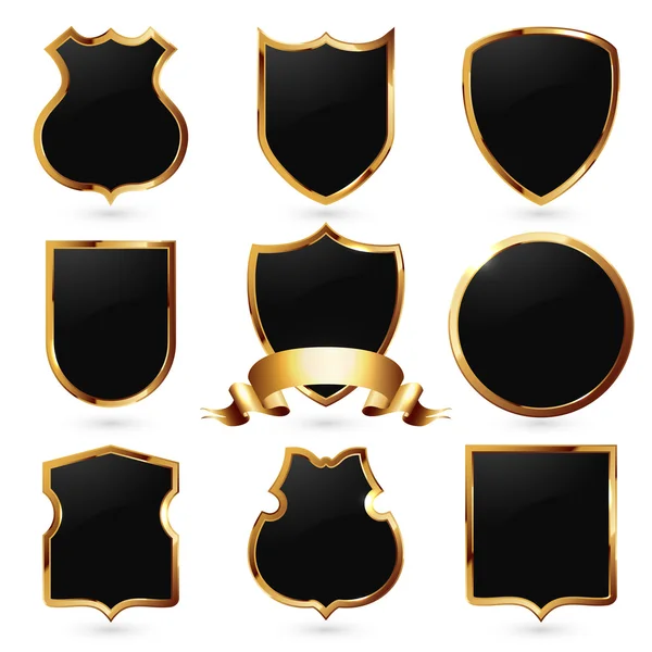 Coleção de escudos pretos e dourados — Vetor de Stock