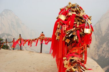Golden locks at holy Mount Hua Shan, China clipart