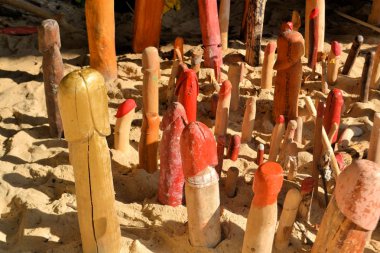 Wooden phalluses in Penis cave, Thailand