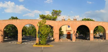 Spanish colonial aquaeduct in Morelia, Central Mexico clipart