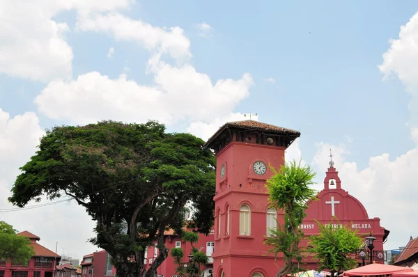 Dutch Clock Tower and Christ Church in Malacca, Malaysia — Stock Photo, Image