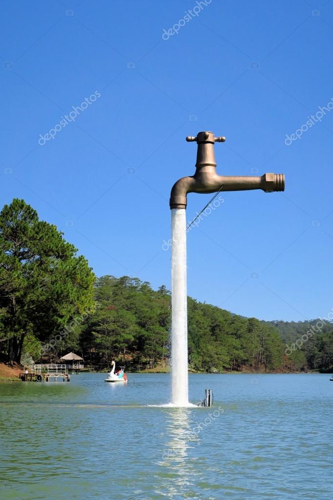 Free Standing Faucet Floating Over A Lake Stock Photo C Flocutus