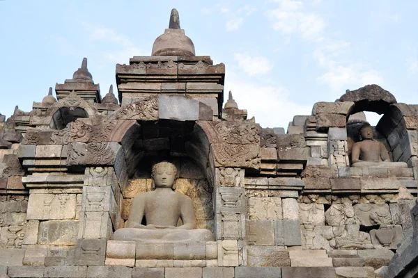 Buddhy v chrámu Borobudur na ostrově Jáva — Stock fotografie