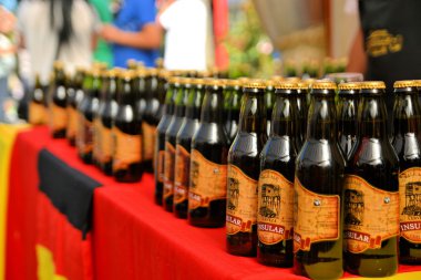 Bottles of beer at Beerfest by former German settlers in Chilean Patagonia