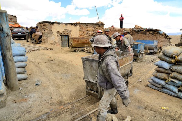 Miners outside of the entrance to Cerro Rico mine in Potosi, Bolivia