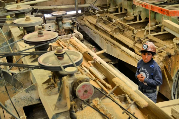 Kid miner at metals and precious metals ore enrichment plant in Potosi, Bolivia Obrazek Stockowy