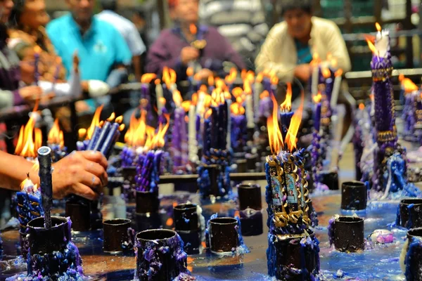 Believers make merit for Lord of Miracles catholic religious procession during purple month in Lima, Peru Zdjęcia Stockowe bez tantiem