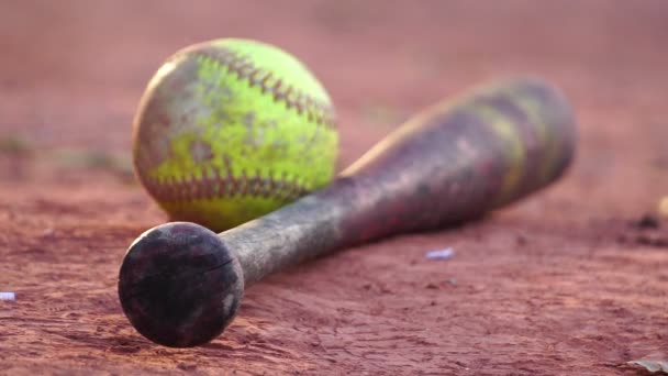 Closeup Footage Baseball Bat Ball Ground Warm Light — Stock Video