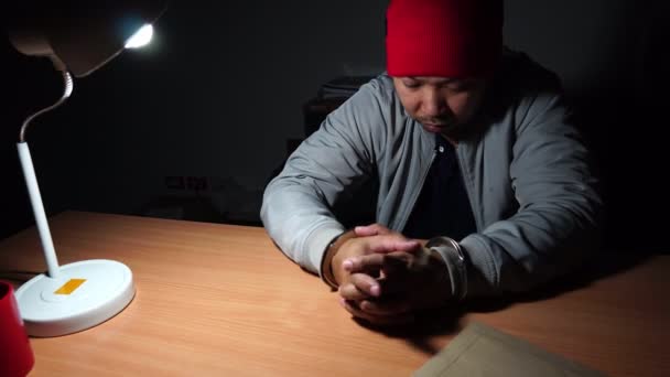 Footage Prisoner Interrogation Sitting Table Researcher Shows Them Evidence — Stock Video