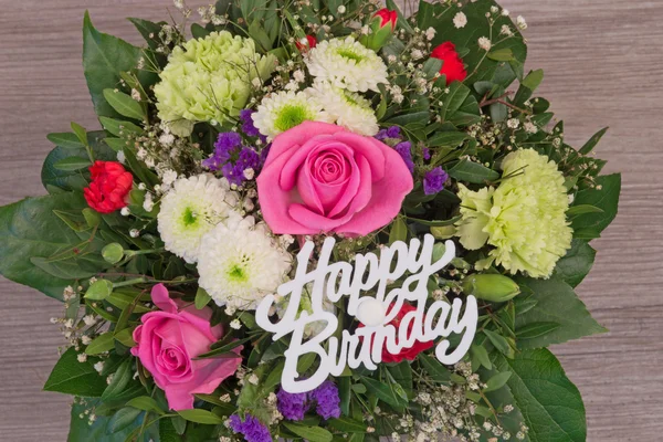 Flower bouquet with text Happy Birthday — Stock Photo, Image