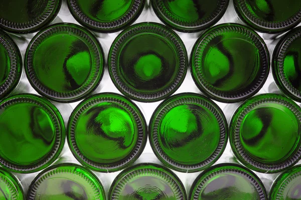 Beer bottles of green glass background — Stock Photo, Image