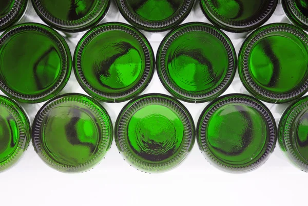 Beer bottles of green glass background — Stock Photo, Image