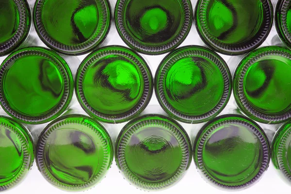 Beer bottles of green glass background Stock Image