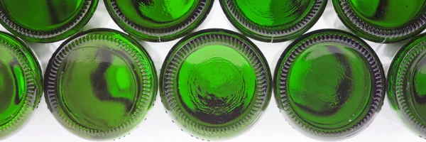 Beer bottles of green glass background Stock Photo