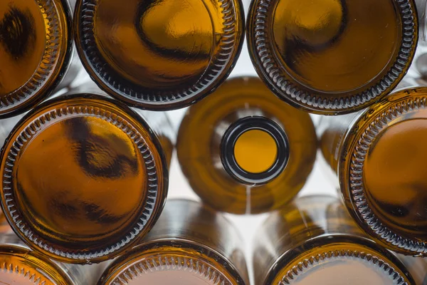 Beer bottles of glass background — Stock Photo, Image
