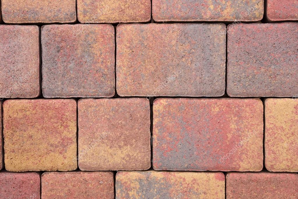 depositphotos_106597488-stock-photo-paving-blocks-made-of-colored.jpg