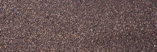Текстура тёмного песка — стоковое фото