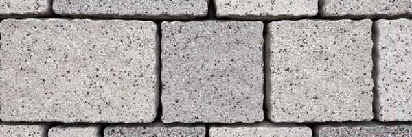 Blocos de pavimentação feitos de pedras cinzentas — Fotografia de Stock