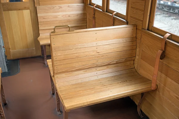 Empty wooden seats in old train — Stock Photo, Image