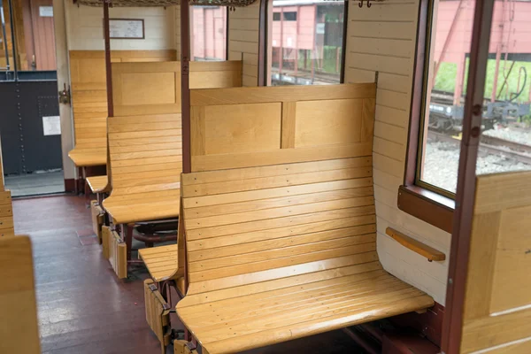 Empty wooden seats in old train — Stock Photo, Image