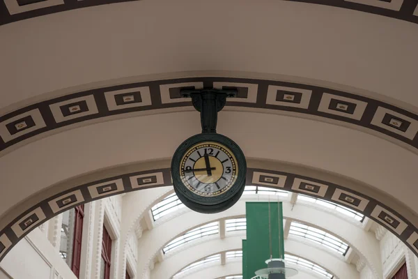 Hanging public clock — Stock Photo, Image