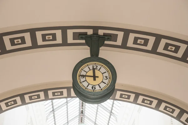 Hanging public clock — Stock Photo, Image