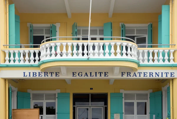 Liberte, Egalite, Fraternite under a balcony — Zdjęcie stockowe