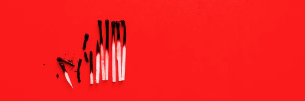 Burnt Out Matches Red Color Background Panoramic Image — Photo