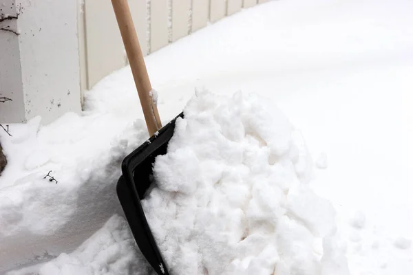 Snow Shovel Clear Snow Front Garage Door — Stock Photo, Image