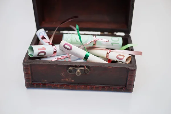 Wooden chest with Euro currency inside — Stock Photo, Image