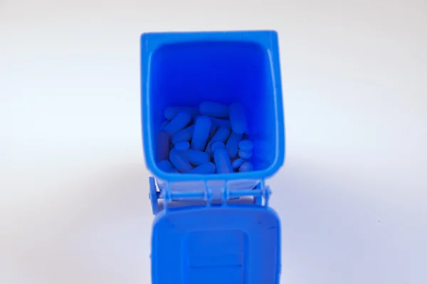 Pills for health in trash — Stock Photo, Image