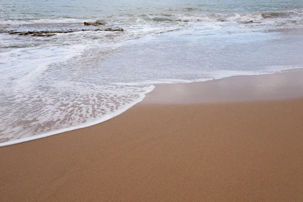 Ocean water and beach sand — Stock Photo, Image