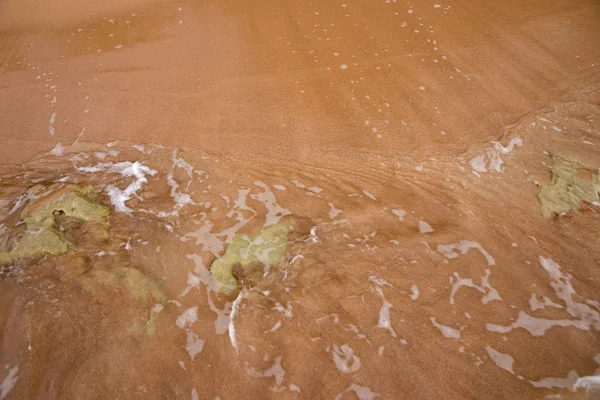 Água do oceano e areia de praia — Fotografia de Stock