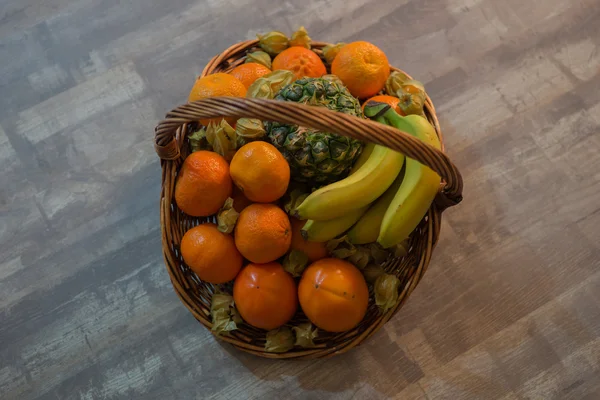 Fresh fruits in a basket — Stock Photo, Image