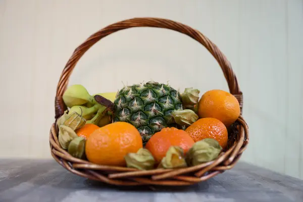 Fresh fruits in a basket — Stock Photo, Image