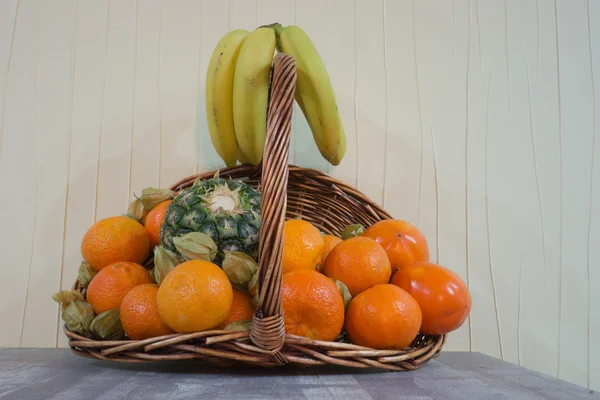 Fresh fruits in a basket — Stock Photo, Image