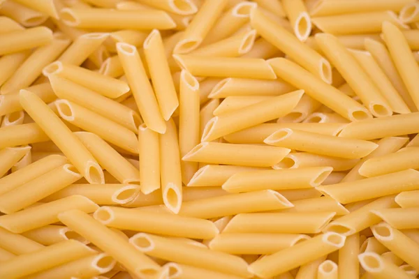 Pasta Penne texture background — Stock Photo, Image