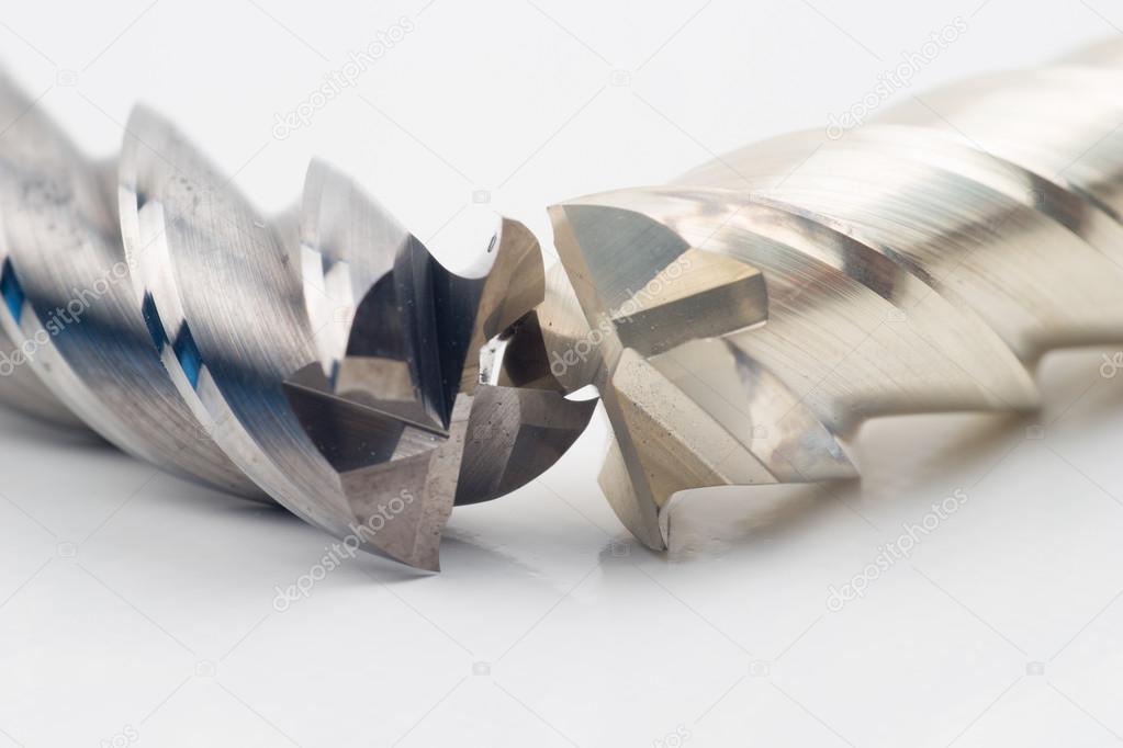 Silver and golden end mill cutter isolated