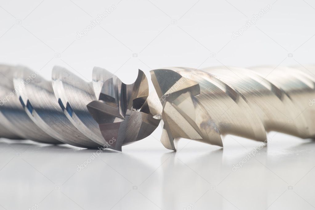 Silver and golden end mill cutter isolated