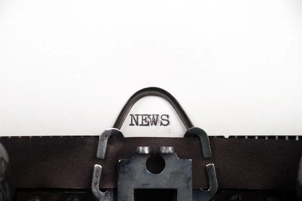 Texto de notícias sobre máquina de escrever retro — Fotografia de Stock