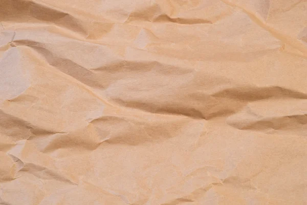 Closeup of brown wrinkled paper background — Stock Photo, Image