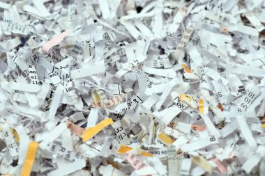 Closeup of shredded paper documents clipart