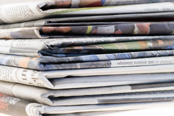 Pile of old newspapers — Stock Photo, Image