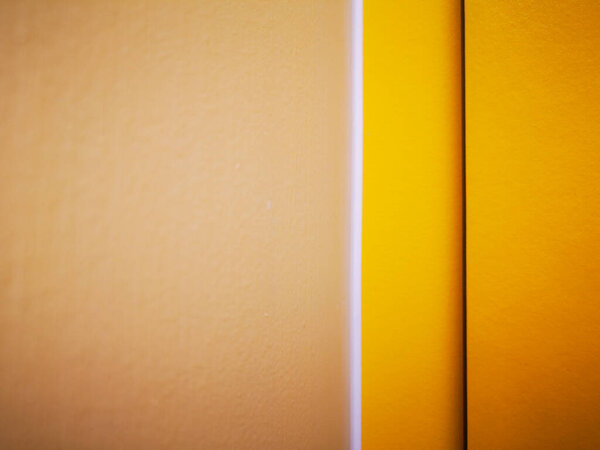 yellow colorful wall surface texture. Abstract grunge bright color 
