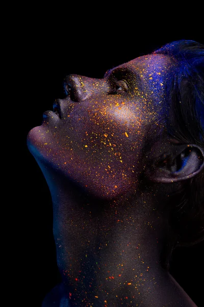 Glowing neon makeup with dramatic look in his eyes. — Stock Photo, Image