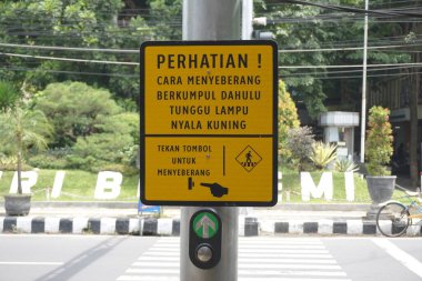Kediri, East Java Indonesia - February 21th 2021: The signs to cross the road